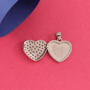 925 silver heart-shaped women's pendant with open locket on pink background