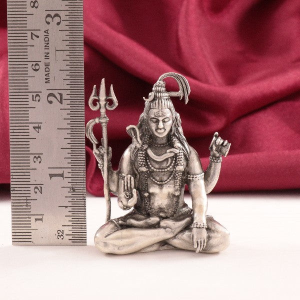 925 silver 3D Sitting Shivan idol weighing 69g, measuring 5.5cm in length, with high purity, placed beside a ruler for size reference.