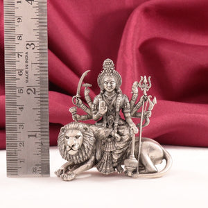 925 Silver 3D Durga Devi idol weighing 87g and 6.5cms in height with intricate detailing, shown next to ruler for scale.