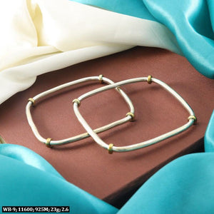 925 silver Riddhi Women Bangles WB-9 with 23g weight and 2.6 size, displayed on a colorful fabric background.