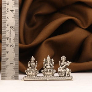 925 silver 3D Ganesha, Saraswathi, Lakshmi idols, 76g, 3cms, purity 925, with ruler for scale