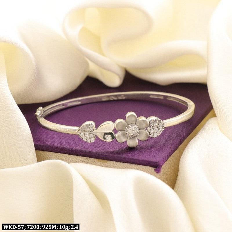 925 silver Sriya women Kada WKD-57, 10g, size 2.4, featuring floral and heart designs, on a white and purple fabric background