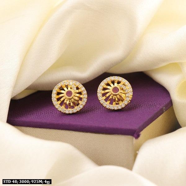 925 silver Naganika Women Studs STD-48, 4g weight, elegant design with intricate detailing on gold and purple fabric backdrop