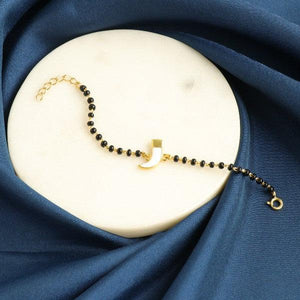 925 silver tiger nail kids bracelet KB-154 on a blue fabric, 3g, 15cm length, 925 purity, elegant design with black beads