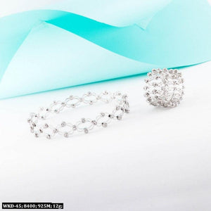 925 silver Jithya women kada WKD-45 with 12g weight and intricate design against light blue background