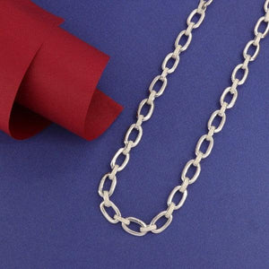 925 Silver Deependu Kids Chain KC-52, 41cms long, 12g, on a blue background next to red paper.