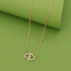 925 silver heart necklace for women, model NK-153, featuring a delicate chain and stylish heart pendant, weighing 4g, on a green background