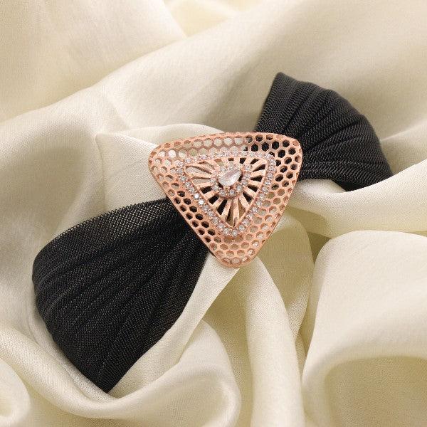 Elegant hair accessory with black fabric and gold-triangle design featuring a central crystal embellishment.