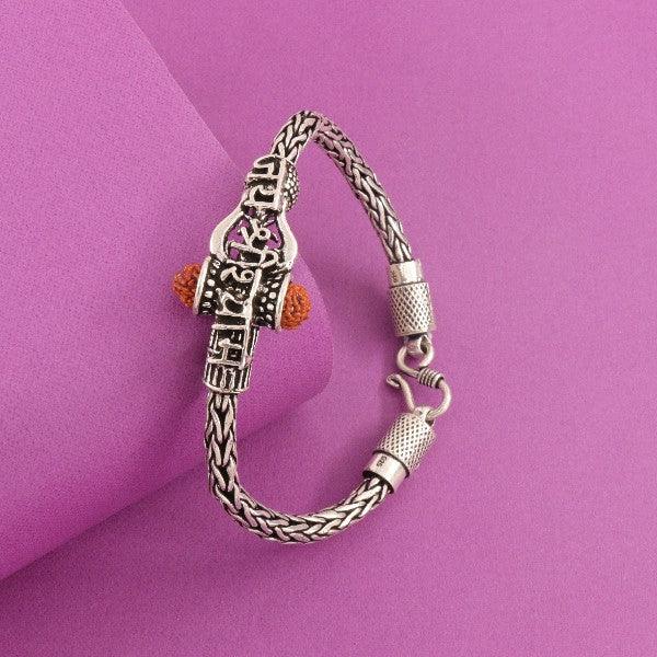925 silver Bahubali men's bracelet MB-220 with intricate design on a vibrant pink background