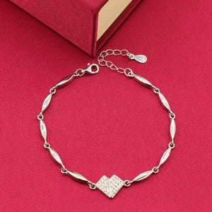 925 silver Komal women's bracelet LBR-202 with heart pendant on red background, 7g, 20cms length, high purity elegant jewelry.