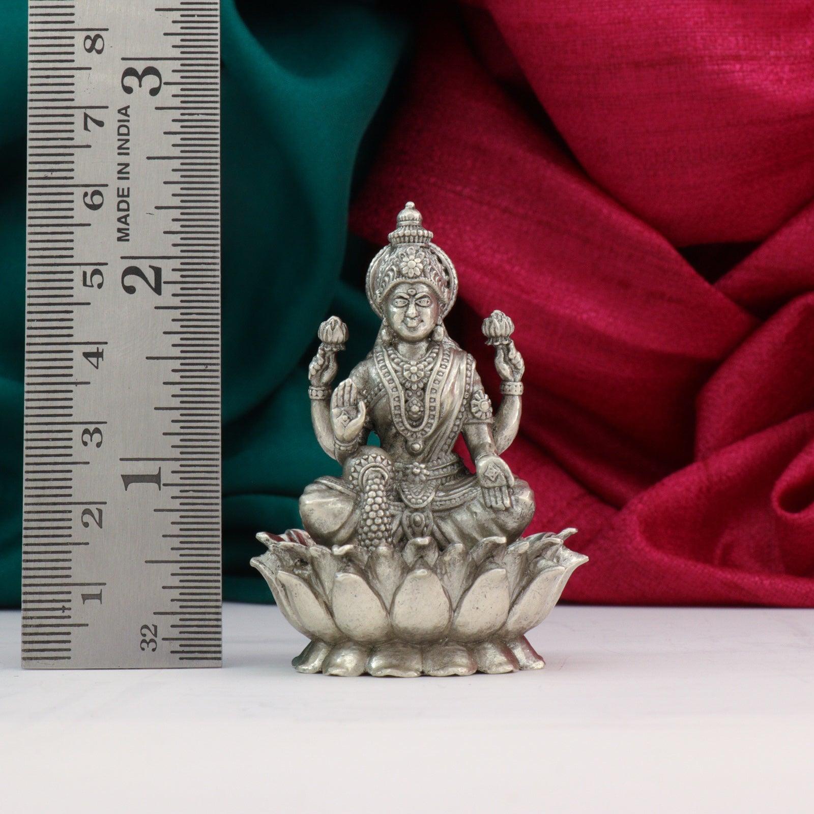 925 Silver Mahalakshmi idol, 3D design, weighs 59g, dimensions 5.5cms, purity 925, with a measuring scale for reference.