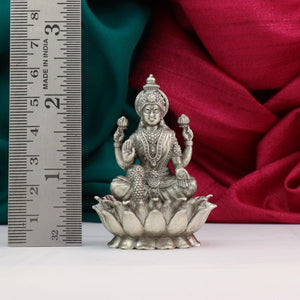 925 Silver Mahalakshmi idol, 3D design, weighs 59g, dimensions 5.5cms, purity 925, with a measuring scale for reference.