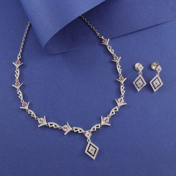 925 Silver Riju Women Necklace NK-186 with matching earrings on a blue background