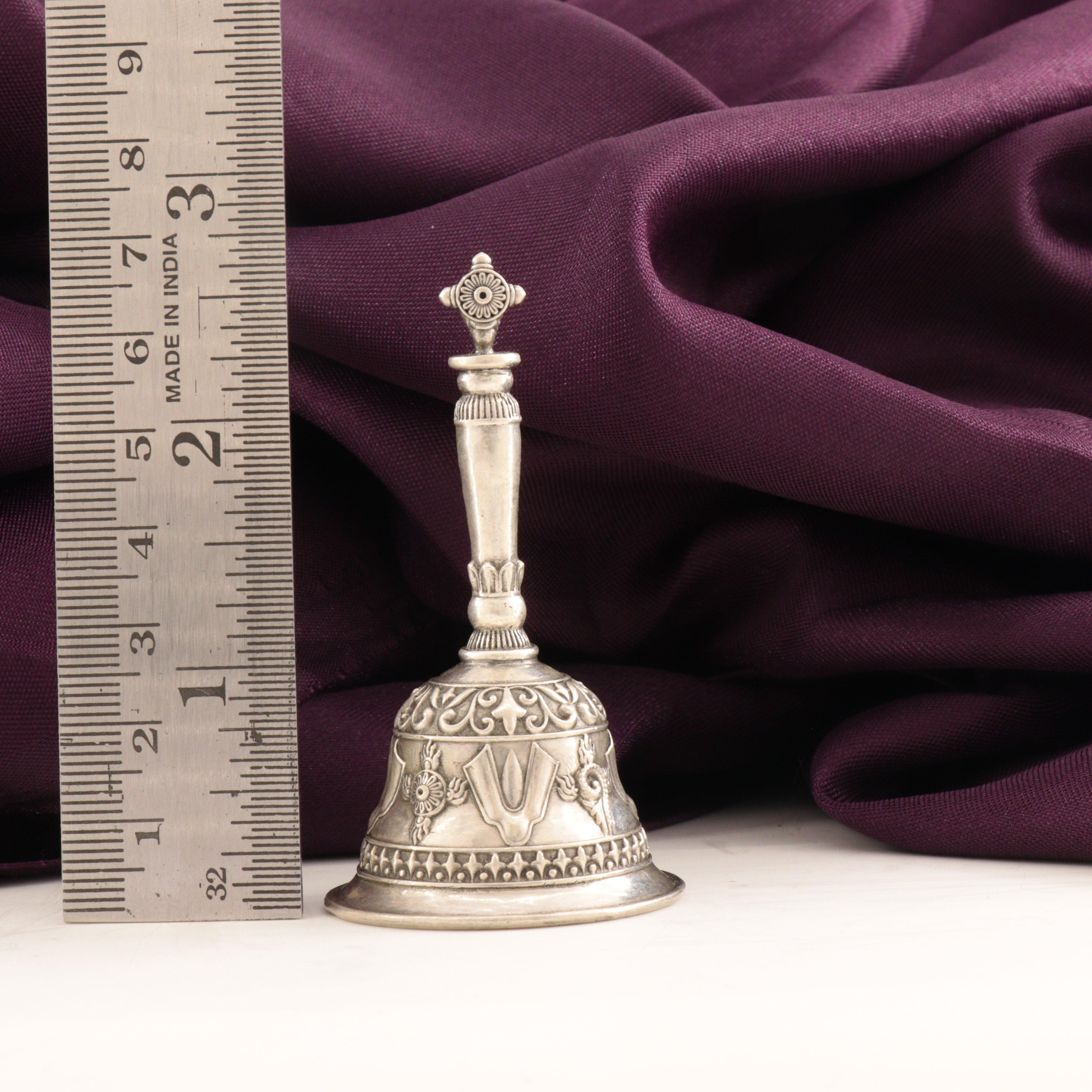 925 silver 3D bell Shanku chakra idol with intricate design, 7cm height, placed next to a ruler for scale.