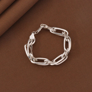 925 silver Timin kids bracelet KB-201, 6g, 15cm length, showcasing classic chain design on a brown fabric background.