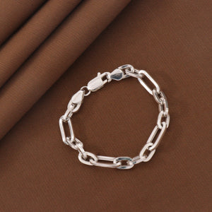 925 silver Ravindra kids bracelet KB-202, 15cm with clasp design on brown background.