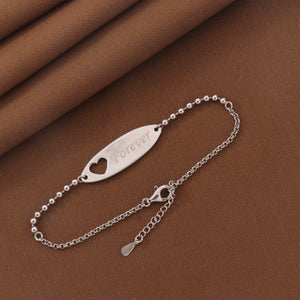 Elegant 925 silver Rishika women bracelet with a "Forever" heart design, weighing 4g and measuring 20cms in length.