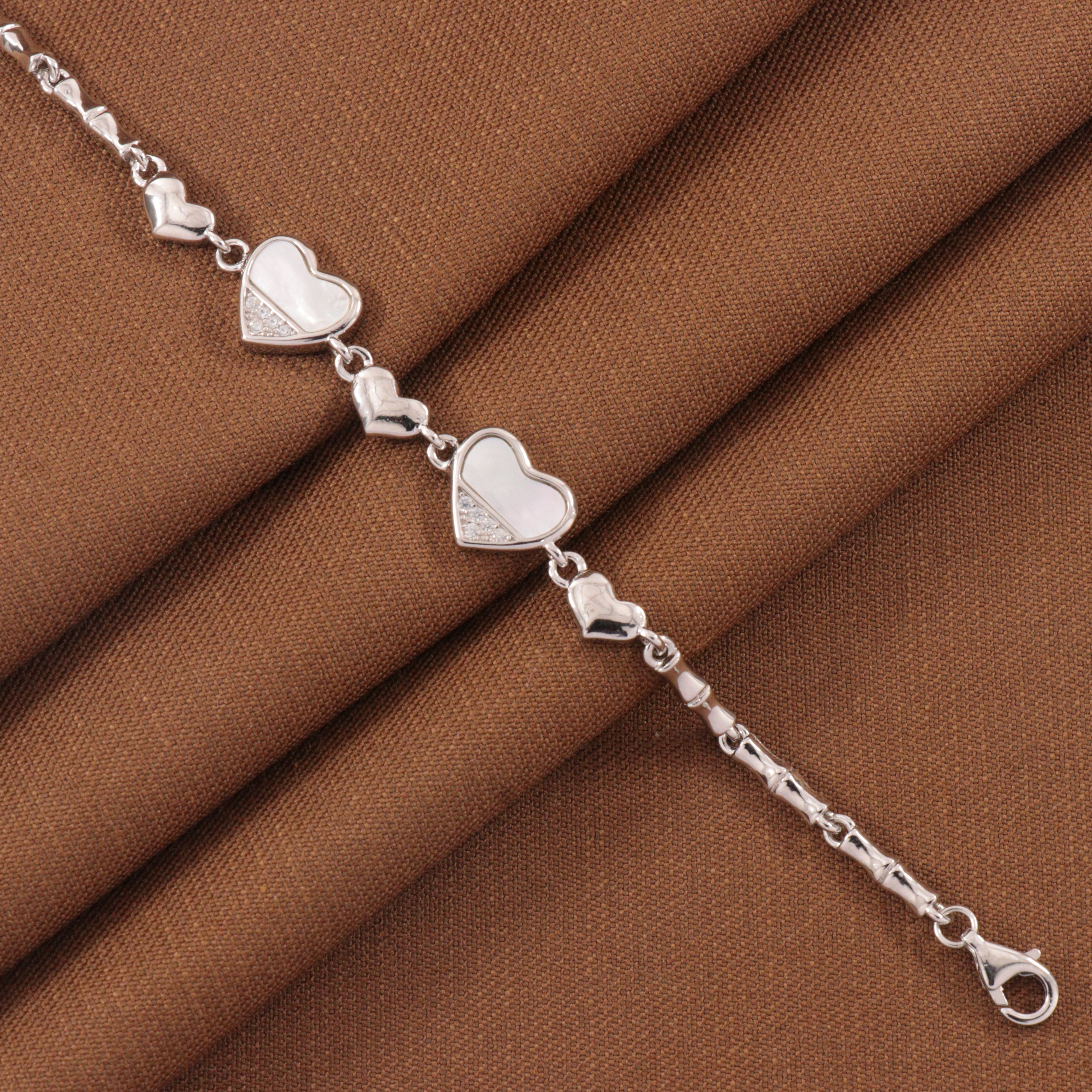 925 silver Tejaswini kids bracelet KB-236 with heart design, 6g, 17cms long, showcasing elegance and purity for children's fashion.