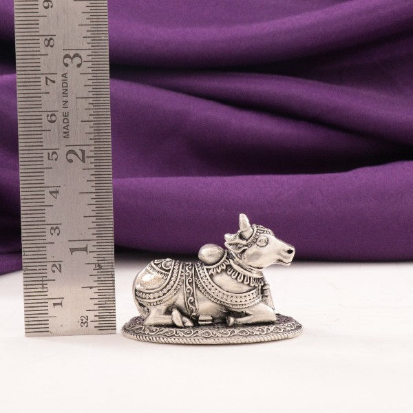 Detailed 925 silver 3D Nandi idol with intricate design, weighing 53g and measuring 3.5cm, displayed next to a measuring scale.