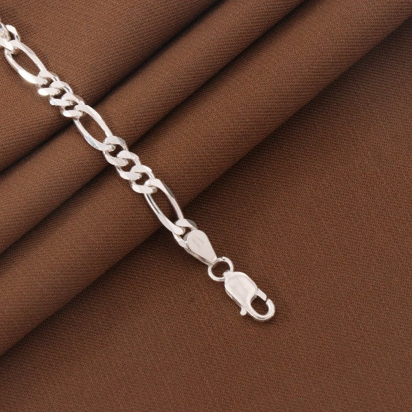 925 silver kids bracelet with lobster clasp on brown fabric, showcasing elegant chain design, 18cm length, suitable for children.