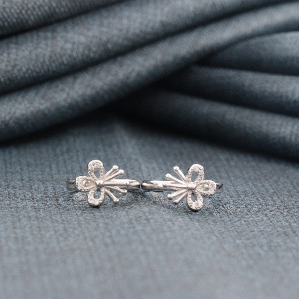 925 Silver Suravinda Women Toe-Rings TE-302 with floral design on grey fabric