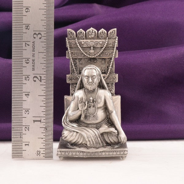 925 silver 3D Raghavendra idol, 80g, 7.5cm, showcasing intricate design and purity, placed beside a ruler for size reference.