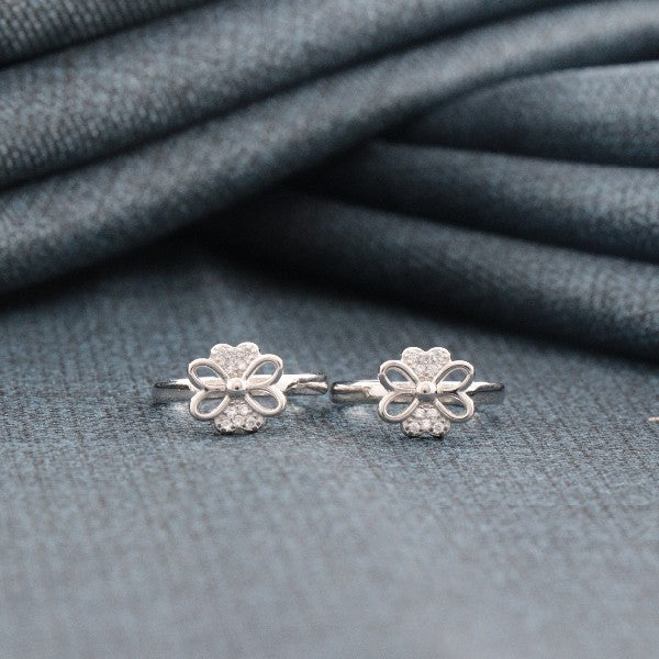 925 silver Pia women's toe rings TE-297, flower-shaped design, purity 925, 4g weight, elegant jewelry on blue fabric background