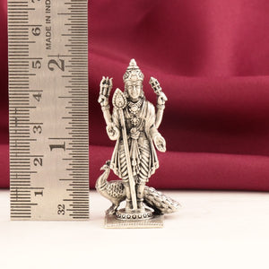 925 silver 3D Murugar idol weighing 32g and measuring 5cms in height next to a ruler for scale.