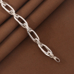 925 silver kids bracelet Timin KB-201, 15cm length, on brown fabric background.