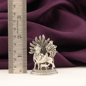 925 silver 3D Kamadhenu idol with tree, 48g weight, 5cm length, placed next to a ruler for scale.