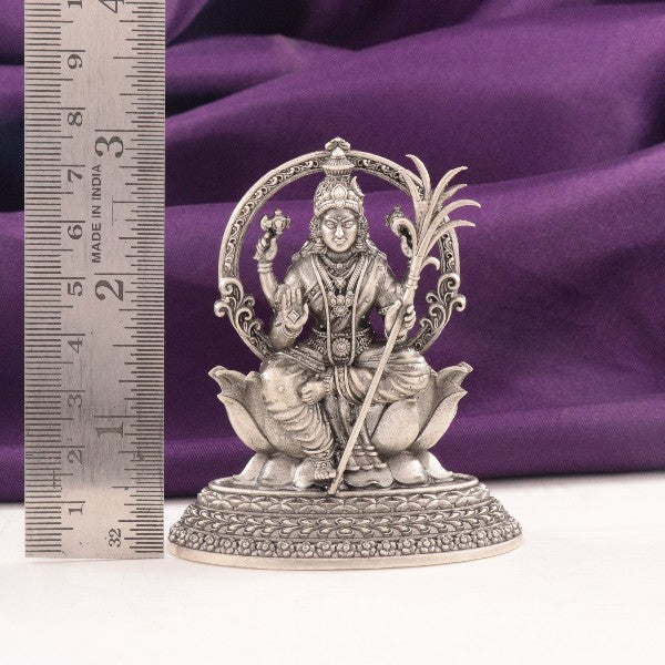 925 Silver Lalitha Devi Idol, 7.5cm, 80g, shown with ruler for scale, on a purple fabric background.