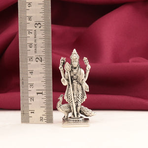 925 silver 3D Murugar idol, 5.5cm tall, weighing 40g, with purity 925, displayed against a red fabric backdrop with a ruler for scale