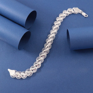 Elegant 925 silver Ashu men bracelet MB-248 with intricate design, 21g weight, 22cms length, displayed on blue background