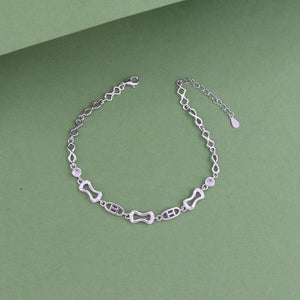 925 Silver Shravanti Women Bracelet LBR-370 featuring intricate design, 22.5 cm length, and 6g weight on green background. Pure 925 Silver Bracelet.