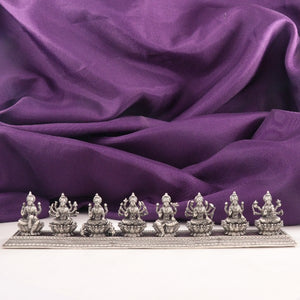 925 Silver 3D Ashtalakshmi Idols, 287g, 4cm, Purity 925, featured against a rich purple fabric background.