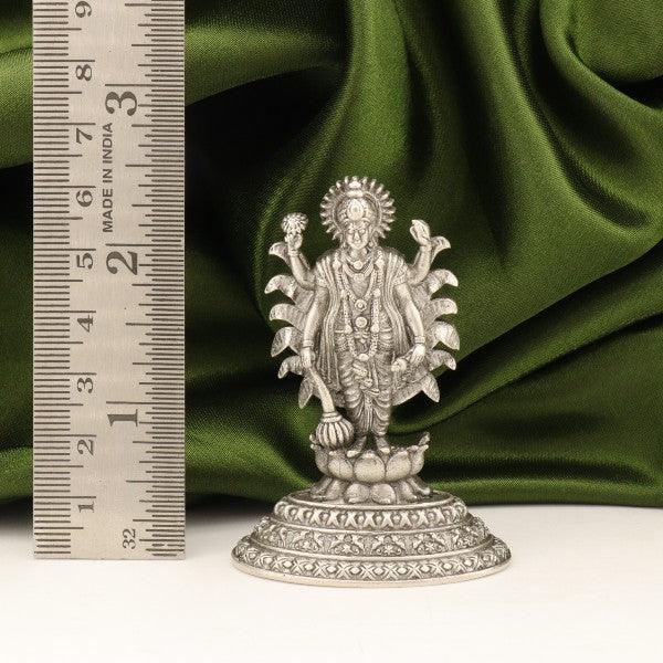 925 silver 2D Satyanarayana Swamy idol, 35g, 6.5cms, with a ruler for size reference, against green fabric background