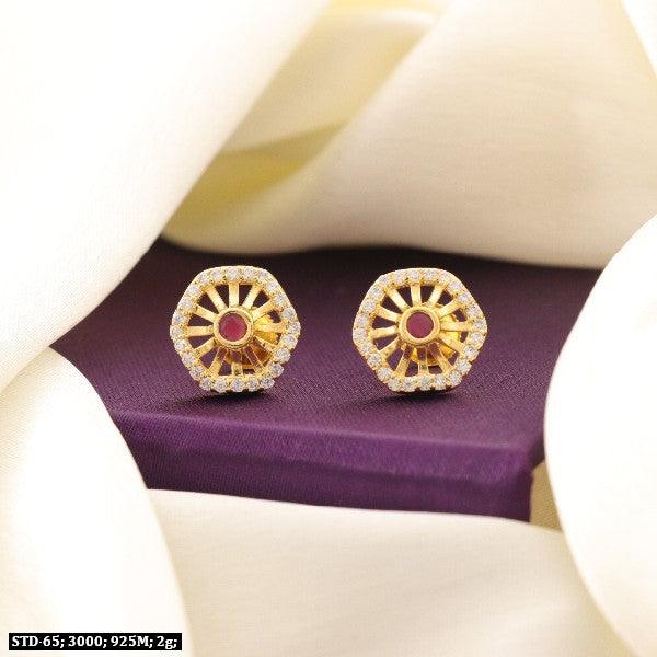 925 silver Shukla women's studs weighing 2g with a unique hexagonal design displayed on a purple fabric background