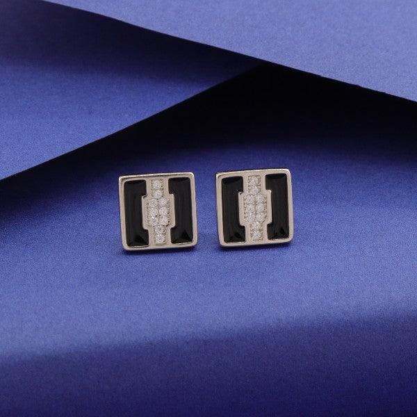 925 Silver Ritu Women Studs STD-226 with black and silver design on blue background