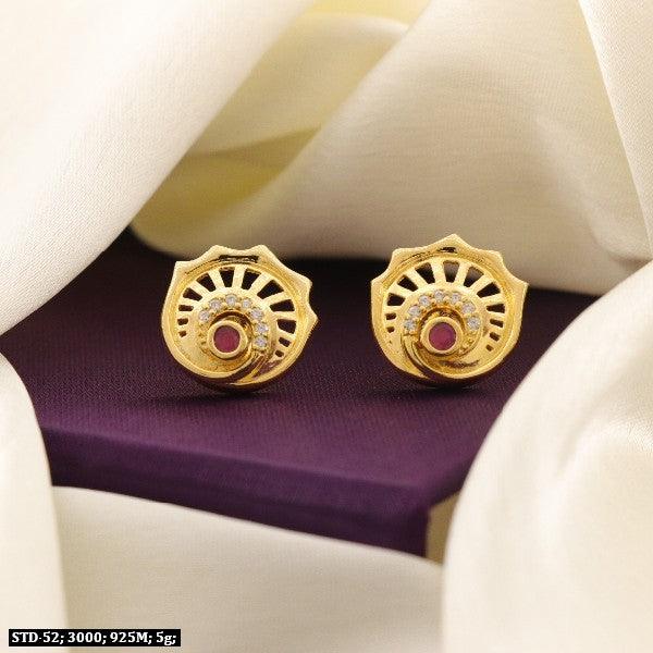 925 silver peacock women studs, STD-52, gold-toned earrings with intricate design and red stone, 5g, purity 925, on a purple background.