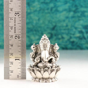 3D Ganesha idol made of 925 silver weighing 76g and standing 5cm tall, displayed next to a ruler for size reference.