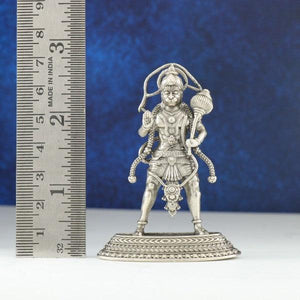 925 silver 3D Hanuman idol weighing 46g and measuring 7cms, showcasing fine craftsmanship, next to a ruler for scale