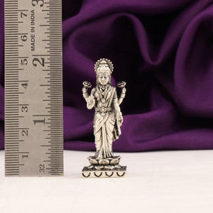 925 silver 3D Mahalakshmi idol weighing 27g and 5cm in height, showcasing intricate craftsmanship next to a ruler for scale.