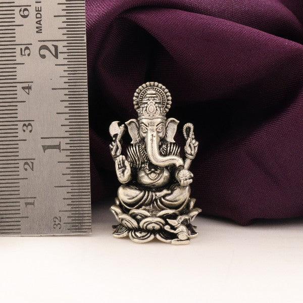 925 silver 3D Ganesha idol weighing 45g and measuring 4cms in height, next to a ruler for scale.