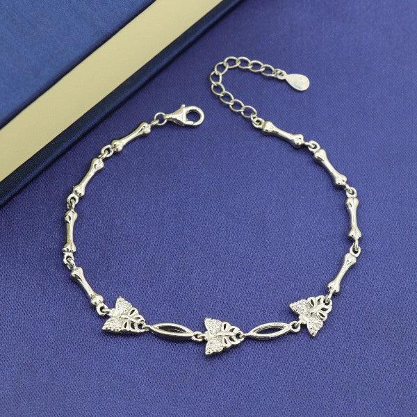 Elegant 925 silver Vanita women's bracelet LBR-244 with butterfly charms, 21.5cms length, 7g weight, displayed on a blue surface.