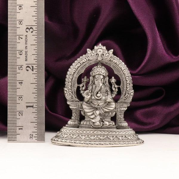 925 silver 2D Ganesha idol, 60g, 6.5cm tall, with a purple backdrop and ruler for scale