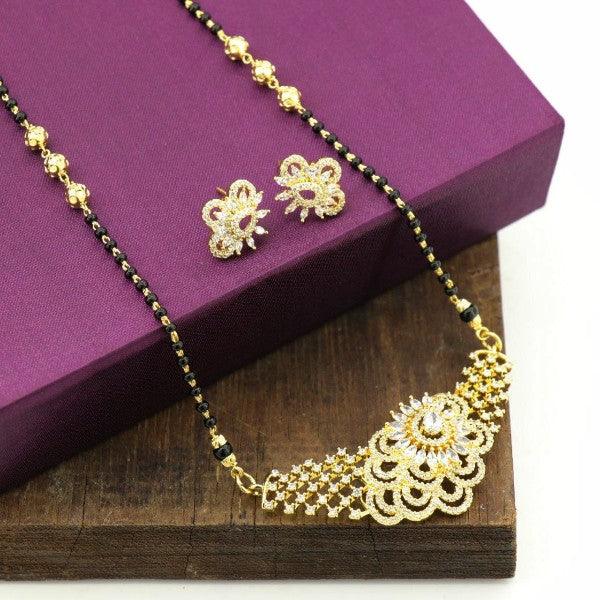 925 silver Sumati women necklace NK-100 with intricate design displayed with earrings on a wooden surface and purple box