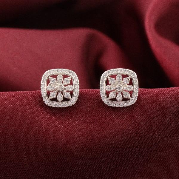 925 silver Damini women studs STD-248, 3g weight, intricate floral design, elegant square-shaped earrings on red fabric background