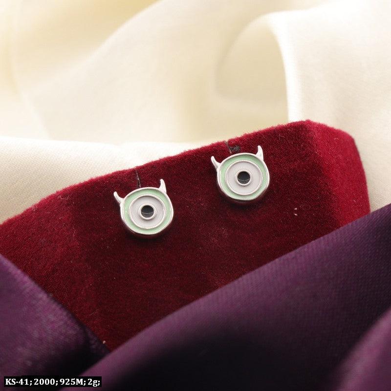 925 silver Heera kids studs KS-41 displayed on a velvet and silk fabric background.