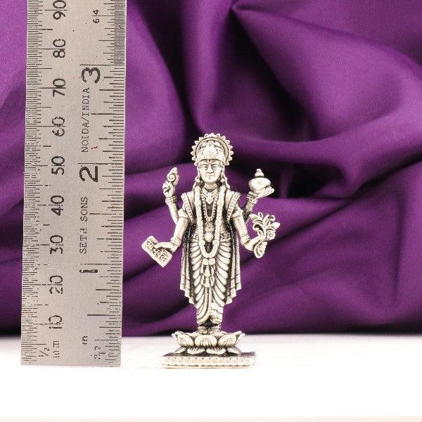 925 silver 3D Dhanvanthri idol weighing 39g with dimensions of 6cms, displayed with a scale for size reference.