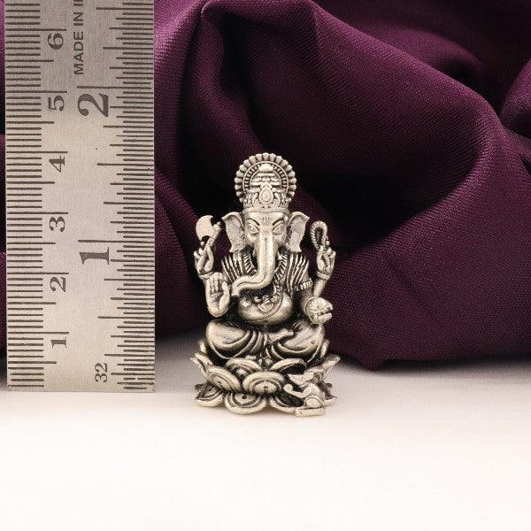 925 silver 3D Ganesha idol, 47g weight, 4cm height, purity 925, displayed next to a ruler on a purple fabric backdrop.